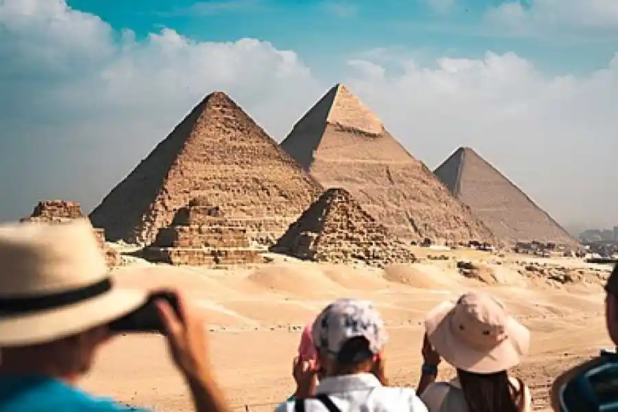 Best tours in cairo egypt featuring Giza Pyramids complex and National Museum of Egyptian Civilization NMEC